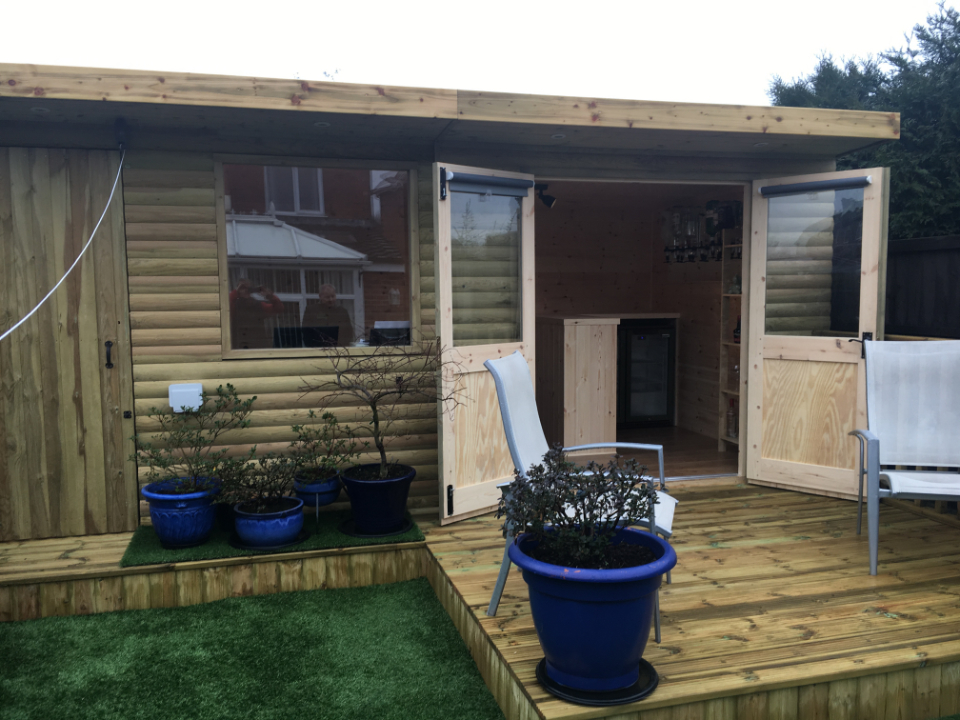 Outdoor building with integrated bar and storage Derby City